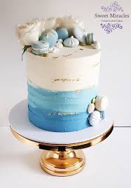 I am a firm believer in the transferability of sugar through the computer screen and this rose ombre cake is the perfect vessel. Blue Ombre Buttercream Cake With Macarons And Roses Buttercream Cake Buttercream Cake Designs Cake