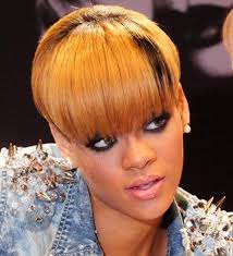 After chopping off her hair and donning a short blonde wig with bangs on may 13, she's back to rocking long, blonde waves. Rihanna Blonde Hair 2012 Rihanna Age Albums