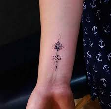 Awesome color flowers tattoo on left wrist. Best Tattoo Design Ideas For Your Wrist Body Tattoo Art