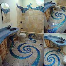 Ceramic and porcelain tile thanks to their creative potential and vast array of colors, patterns, shapes, and sizes, ceramic and porcelain tiles can't be beat when it comes to cheap bathroom flooring ideas. Mosaico No Banheiro Mosaic Bathroom Mosaic Bathroom Tile Bathroom Tile Designs