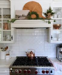 Reds, greens, whites, and rustic browns. Simple Christmas Decorating French Holiday Style In The Kitchen