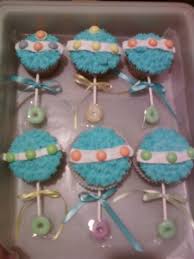 8 Baby Rattle Made With Cupcakes Photo Baby Rattle Cupcake Cake Baby Shower Rattle Cupcakes And Baby Shower Rattle Cupcake Cake Snackncake