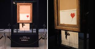 Banksy shredder this effect can generate an image in high resolution this effect can generate an animated image banksy is an anonymous english street artist who wows the public with his satirical street art. Partial Shredding Of Banksy S Girl With Balloon Art At London Auction Was A Malfunction