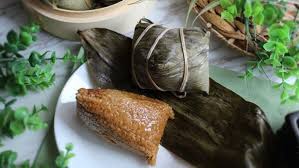 Zung2) is a traditional chinese rice dish made of glutinous rice stuffed with different fillings and wrapped in bamboo leaves (generally of the species indocalamus tessellatus), or sometimes with reed or other large flat leaves. Fgq Zjvowidyzm