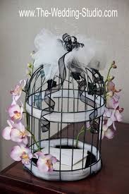 Bird Cage Decor Ideas For Weddings The Wedding Studio Illinois Photo Video Dj Photo Booth Bird Cage Decor Country Western Wedding Wedding Envelopes
