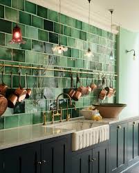 Her clients had zero hesitation about the color. Emerald Green London Tiles Devol Kitchens