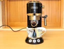 The machine delivers short bursts of pressurized and heated water to the coffee grounds instead of a continuously flowing form. Delonghi Dedica Review Trusted Reviews