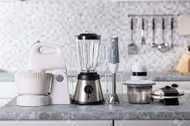 Set of appliance in the new appartments. Various Type Of Kitchen Appliances On Worktop In Kitchen Stock Photo Picture And Royalty Free Image Image 122651593