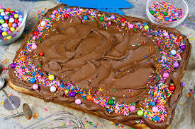 If it's not a sheet cake recipe, you can check out this brilliant guide to help you determine how to increase/decrease the recipe to fit into a sheet pan. Yellow Sheet Cake With Decadent Chocolate Frosting