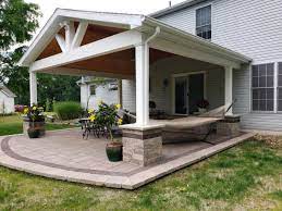 Want a covered deck or partially covered deck? Covered Patio In Kent Oh Showcases Gorgeous Hardscapes In A Protected Outdoor Space