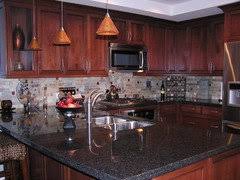 backsplash with black granite counters