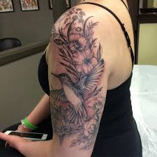 Bird And Flower Tattoo Humming Bird Tattoo Flowers Leaves Blackandgrey Realism Hummingbird Tattoo Bird Tattoo Sleeves Bird Shoulder Tattoos