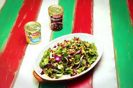 Tiny durum wheat semolina cooks on the stovetop then gets tossed with colorful vegetables, feta cheese, olives, and garbanzo beans. Mexican Bean And Cous Cous Salad The Cook S Pantry