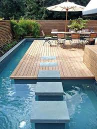 Standard rectangular dimensions for a backyard pool are 16 feet by 32 feet and 20 feet by 40 feet. Hay Bale Swimming Pool Standard Backyard Swimming Pool Size Swimming Pool Ideas For Small Backyard Pool Landscape Design Small Backyard Design Pool Landscaping