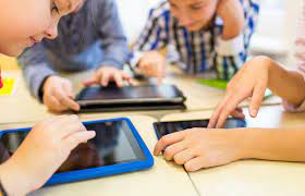 487093020 | close up of school kids playing with tablet pc | verkeorg |  Flickr