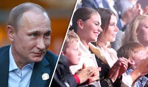 Here is what we know about the mysterious lives of putin's secret kids. Putin S Lover Alina Kabaeva Pictured With Children Wearing Wedding Ring World News Express Co Uk