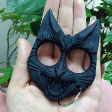 This black cat self defense tool will calmly hide as a keychain until it needs to protect you. Wild Cat Keychain Tool Self Defense Keychain Cat Self Defense Keychain Self Defense