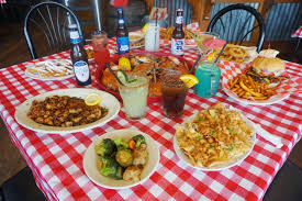 Popeye offers some of the most popular fast foods that include the famous popeyes chicken sandwich, wings, legs, tenders, nuggets, popcorn shrimp, and a variety of sides like mashed and baked potatoes with gravy, cajun fries, green beans, cajun rice, and a diverse breakfast menu. Cajun Food Catering Service Crawfish Seafood Boil Lafayette La The Cajun Table Llc
