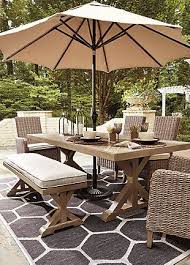 Check spelling or type a new query. Beachcroft Dining Table With Umbrella Option Ashley Furniture Homestore Outdoor Patio Table Backyard Furniture Patio Decor