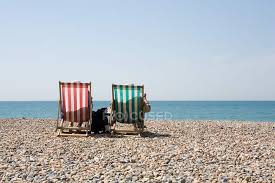 Free delivery over £40 to most of the uk great selection excellent customer service find everything for a beautiful home. Rear View Of Deople In Deckchairs At Sandy Beach Traditional Vacation Stock Photo 165303442
