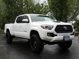 3 rough country lift, 1.25 spidertrax wheel spacers, stock wheels, 285/75/16 cooper st maxx tires. 2016 Toyota Tacoma Trd Sport 4x4 Navi Sunroof Loaded Lifted