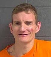 Man arrested after chase ends in crash