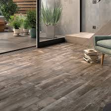 At one time, porcelain tiles were notably more expensive than standard ceramic tiles, though this difference has largely evaporated as porcelain has gained in popularity. Tile Shop In Ottery St Mary Near Exeter Devon Devon Tiles