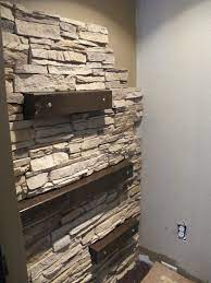In this tutorial, we learn how to install stone veneer on an interior wall with lowe's. Diy Installing Faux Stone Indoors Stone Accent Walls Diy Brick Wall Brick Accent Wall