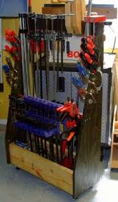 When you've got so many clamps that it's a problem getting them to where the work is being done, build this rolling clamp rack! Free Printable Plans Build A Mobile Clamp Rack Woodworking Plans Free How To Plan Shop Storage