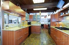 Mid century modern kitchen floor tiles. 1952 Time Capsule House With Luscious Original Terracotta Floors And Attached Greenhouse