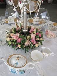 Flowers Around Your Candelabra In Dusky Pinks Soft Peaches And Creams For A Vint Candelabra Wedding Flowers Greenery Wedding Decor Wedding Table Centerpieces