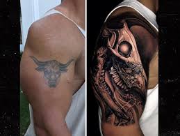 Check spelling or type a new query. The Rock Covers Up Iconic Bull Tattoo With Bigger Bull Tattoo