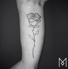 Bali tattoo by bacht on instagram: 20 Minimalistic Flower Tattoos For Women Tattooblend