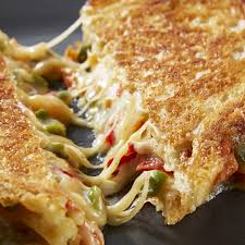 Olive Pepper Grilled Cheese Sandwiches With Butter Lettuce Cherry Tomato Salad Recipe Cherry Tomato Salad Grilled Cheese Stuffed Peppers