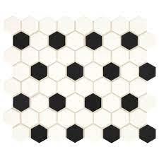 Black and white zig zag tiles create movement on the floor while oversized white hexagon tiles bring interest to the wall. Mohawk Vivant White And Black Hexagon 12 X 14 Ceramic Mosaic Tile At Menards