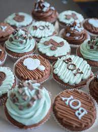 Simple cupcake toppers, made from fondant, for a boy baby shower. Baby Boy Shower Cupcakes Baby Boy Cupcakes Baby Shower Desserts Cupcakes For Boys