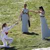Story image for tokyo 2020 torch lit from Reuters