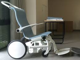 Movi Is A Radically New Form Of Wheelchair Offering Exceptional Comfort With A Built In Power Assist Lift Transport Chair Wheelchair Chair