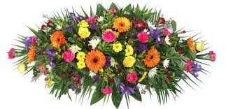 Casket sprays may include a single type of flower or a combination of flowers and foliage to create a stunning arrangement. Funeral Flowers Funeral Coffin Spray Bright Mixed