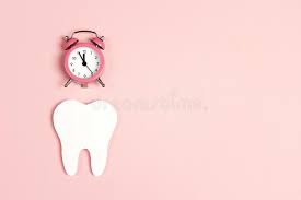 White & pink multi speciality dental clinic was established by dr jeev thomas cherian, to create a centre for excellence in complete dental care, where only the very highest standards in modern dentistry are provided for our patients, to provide the most advanced treatments, the most beautiful and natural smiles and to have the most highly trained and caring team of people. White Tooth With Alarm Clock On Pink Background Time To Dental Health Dentist Day Concept Stock Image Image Of Background Alarm 140548077