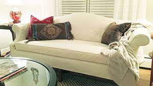 It's amazing how a simple, canvas slipcover can instantly update an old piece of furniture. Custom Made Slipcovers
