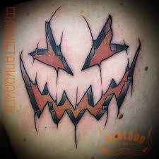 People eat them, put them on tables, hang them in their yard, hold them in hands and… ink them on their bodies. Oxblood Ink Jack O Face By Frankietankbaker Jackolantern