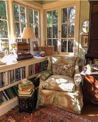 A Stuffed Bookshelf Comfy Chair Cup Of Tea Cozy Carpet And Windows Overlooking Trees What More Could A Girl Want Cozy House Home Cottage Interiors
