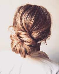 We Love This Undone Ultra Chic Low Bun By Sabrina Dijkman Using Caviar Anti Aging Working Hair Spray For A Lightweight Fl Hair Styles Hair Easy Hairstyles