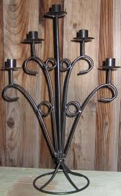 A home can have an awesome design or picturesque exterior or even standing candle holders are always eye catchy and when we are talking about wrought iron candle a nice and tall candle holder in an open corner of a room can definitely change the interior. Featuring This Gorgeous Vintage Tall Black Wrought Iron 6 Pillar Candle Holder Description From Etsy Com I Searched For This On Bing C Svetilniki