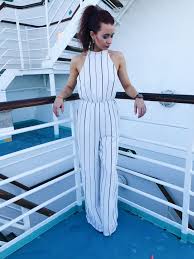 Black And White Striped Jumpsuit Outfit Ideas Stripe Jumpsuit Travel Style Vacation Outfits What To Wear On A Cruise Summer Style Summer Trends Cruise Attire Striped Jumpsuit Cruise Outfits