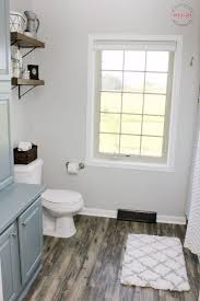 Barn Wood Style Vinyl Plank Flooring Is The Perfect Foundation For Must Have Mom S Farmhouse Bathroom Ma Fixer Upper Bathroom Budget Bathroom Bathrooms Remodel