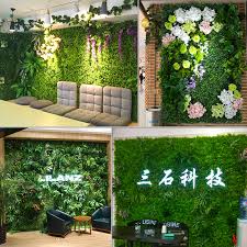 Green, plastic, outdoor greenery screen, faux plant wall backdrop, garden tile decor, fake hedges. Grass Wall Party Decor Novocom Top