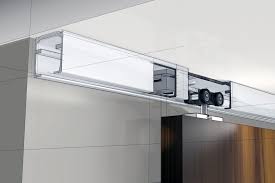 Specifications include head clearance from top of track to top of truck/hanger assembly of 5 3/8 in., 4 in. Architectural Sliding And Folding Door Systems Hettich