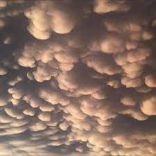 Mammatus clouds are associated with powerful storms that can occur in the summer, and are a sign of the massive quantities of water vapour that are held in the languid summer air. What Are Mammatus Clouds Videos From The Weather Channel Weather Com